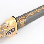 Golden falcon on a damask blade